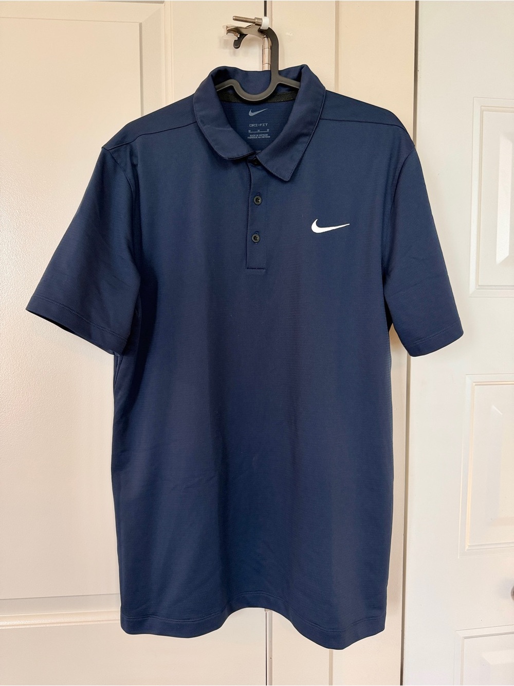 Nike | Men's Navy Polo with White Swoosh | Size M